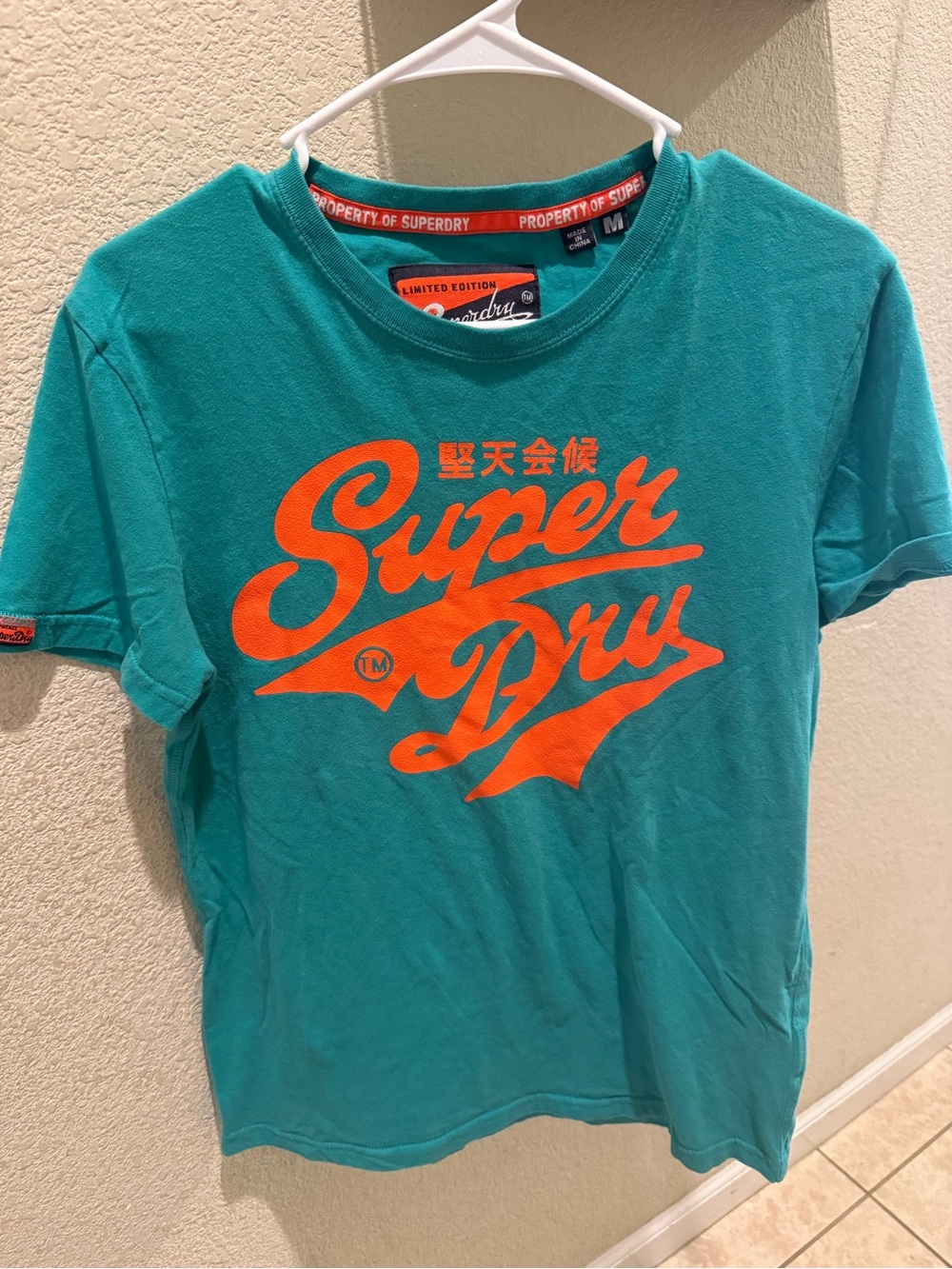 Rare limited edition Superdry Teal Short-Sleeve Tee with Orange Logo